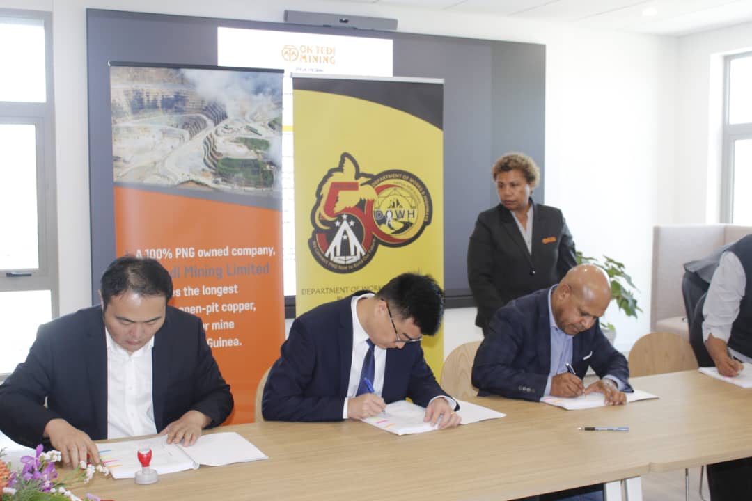 Works Minister Hon. Solan Mirisim, MP Witness the K394 million OK Tedi ITCS road project arrangements for Western Province signed on the eve of 50 years Cover Image